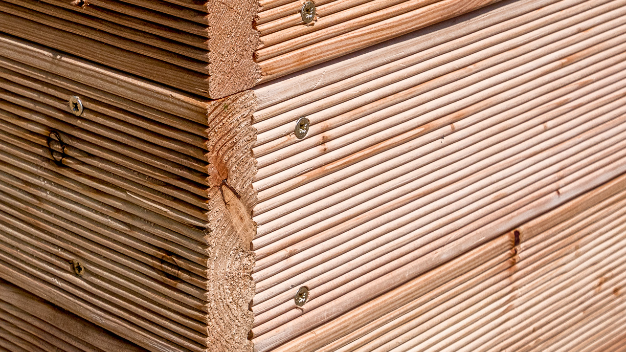 Close up image of wooden panels used for planters